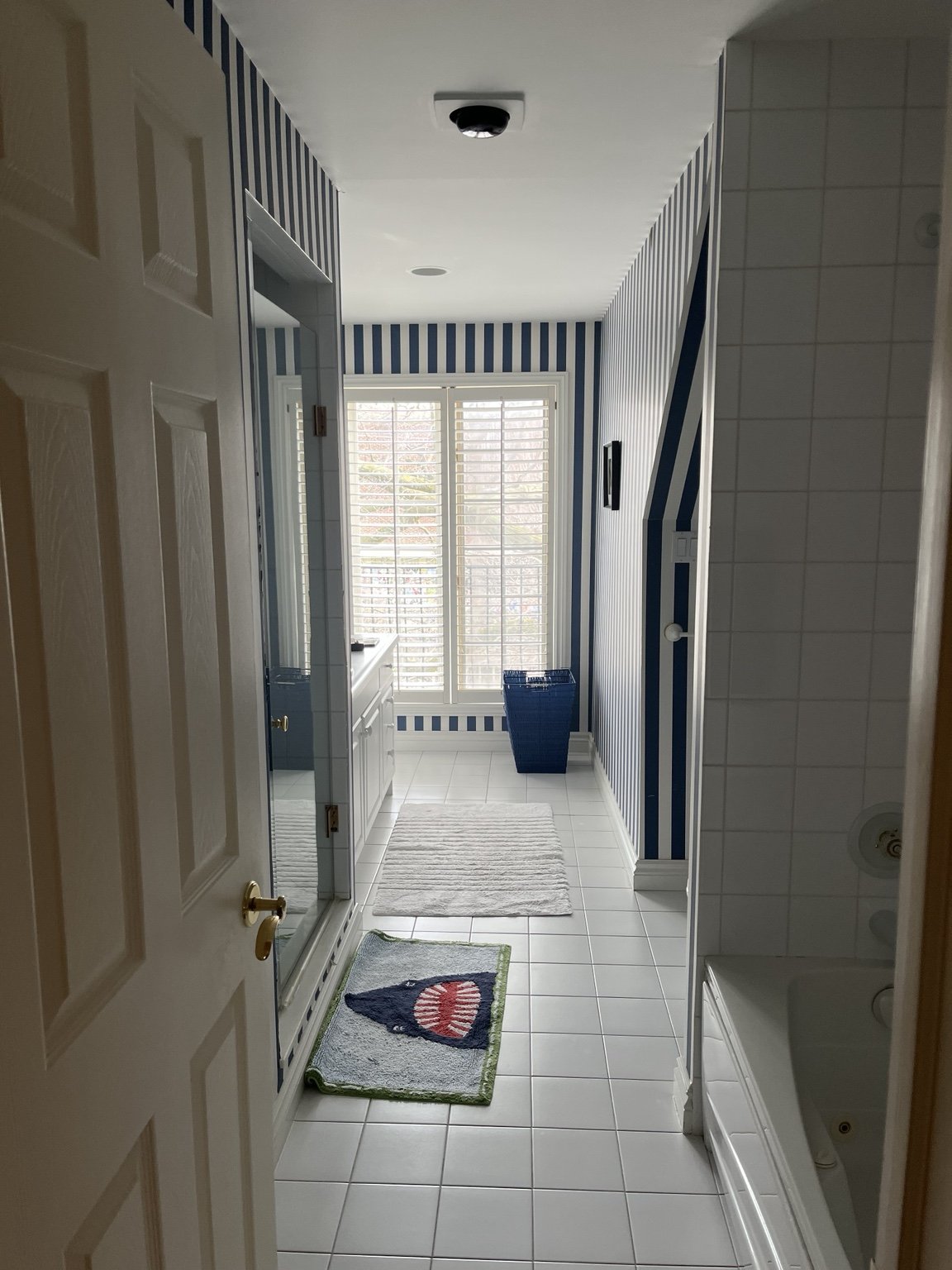 The existing bathroom in the same house.