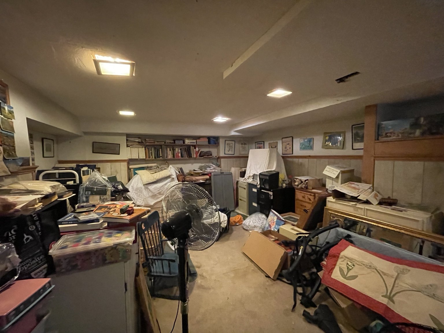 Collections and furniture filled the original basement.