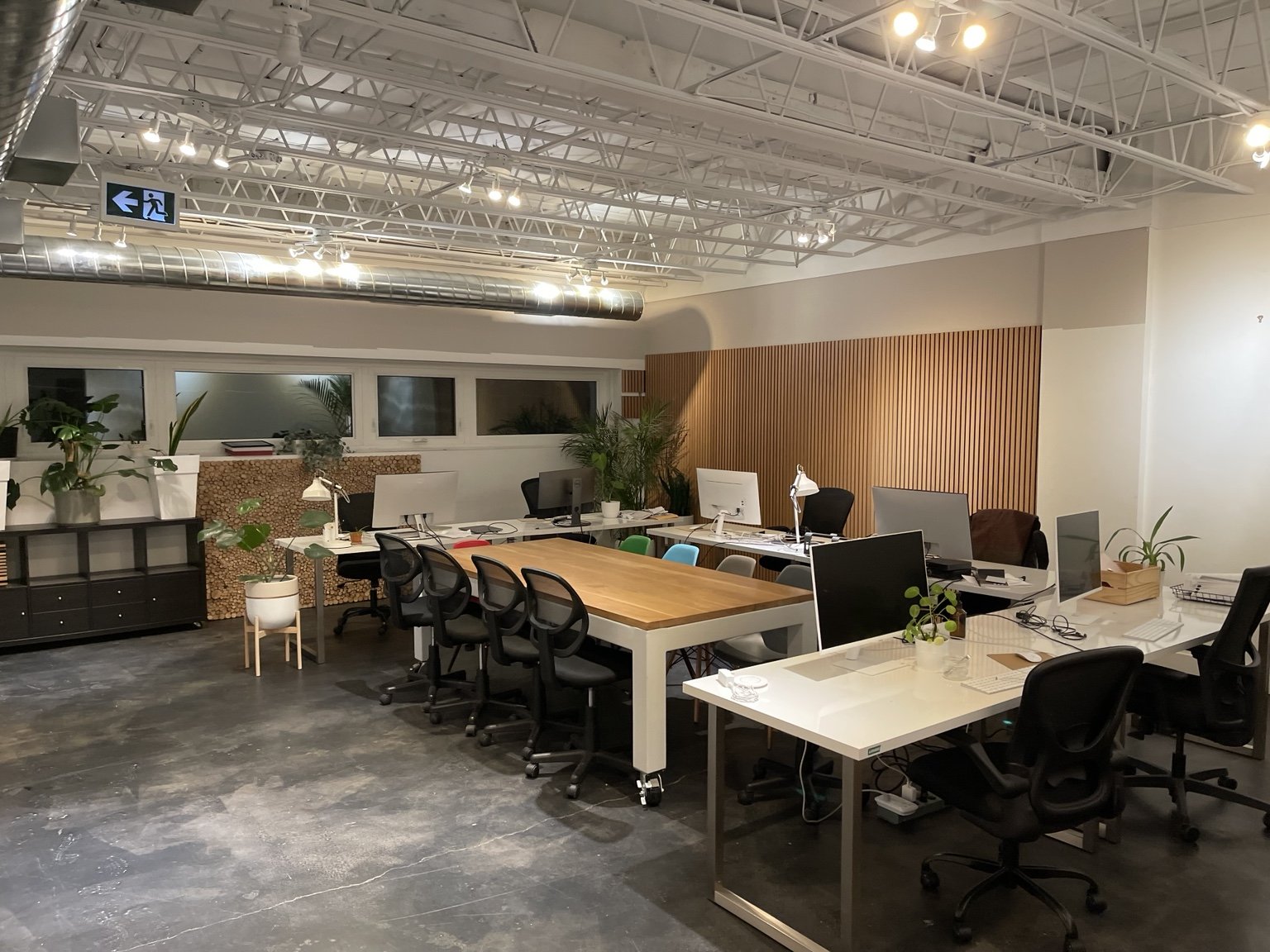 Glazing brings openness to the office within the studio.