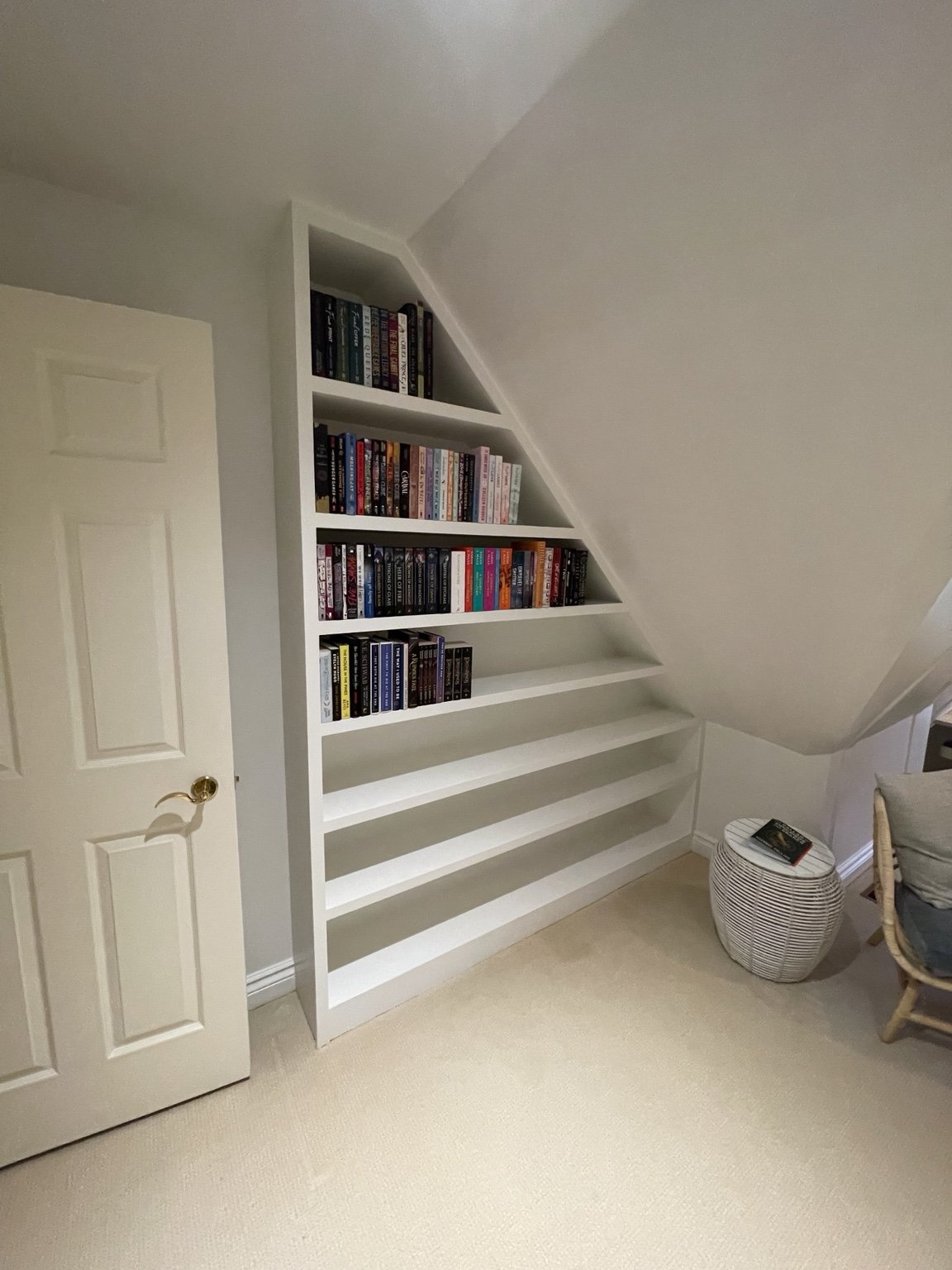 The finished shelves, with concealed support and room for the door to open.